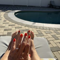 Happy Nails & Spa - Dip on fingernails and regular polis on toes.  I had a prior broken nail and they were able to keep it just fine and rescue it for me!