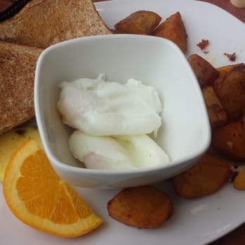 Panagio's All Day Grill - Toast, 3 poached eggs, home fries and 'fruit' lol - Breakfast & Brunch Near Me - Toronto, Ontario Panagio's All Day Grill - Toast, 3 poached eggs, home fries and 'fruit' lol - Breakfast & Brunch Near Me - Toronto, Ontario