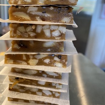 Lux Toffee - Sesame-Miso toffee with blanched slivered almonds and toasted white and tan sesame. - Candy Stores Near Me Lux Toffee - Sesame-Miso toffee with blanched slivered almonds and toasted white and tan sesame. - Candy Stores Near Me