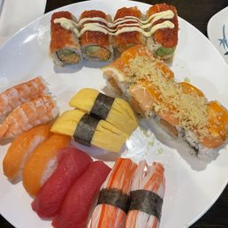 All you can eat sushi: Kani, tamago, salmon, tuna, shrimp, spicy girl roll, and omg roll All you can eat sushi: Kani, tamago, salmon, tuna, shrimp, spicy girl roll, and omg roll
