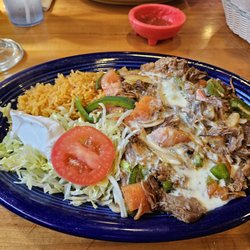 Los Morales Authentic Mexican Restaurant - Cheese Enchiladas pork vegetables cheese sauce rice. Excellent