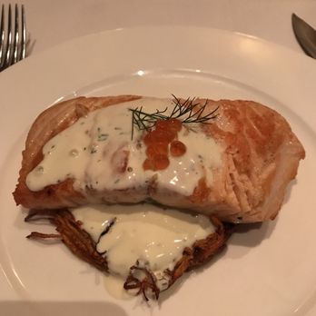 TS Steakhouse - Salmon on a sweet potato latke with dill cream sauce. - Steakhouses Near Me - Verona, New York TS Steakhouse - Salmon on a sweet potato latke with dill cream sauce. - Steakhouses Near Me - Verona, New York