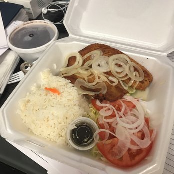 Mango's Cuban Cafe - Grilled tilapia filet with salad, rice and beans - Cuban Near Me - Naples, Florida