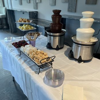 The Chocolate Chick - Twin mini Fountains with white and dark chocolate - Caterers Near Me The Chocolate Chick - Twin mini Fountains with white and dark chocolate - Caterers Near Me