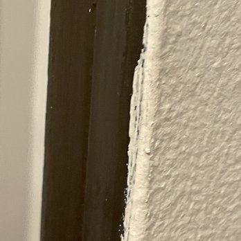 Hastings Painting & Decorating - The front entry door was not painted along the edges so you can see the old paint when you close the door. - Painters Near Me - Evanston, Illinois