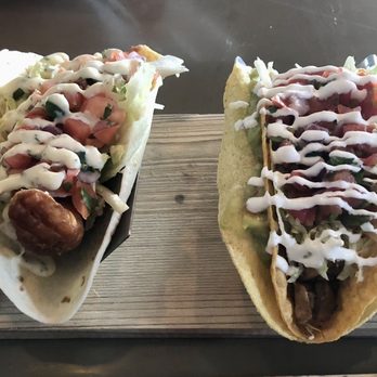 Beer Barrio - L-R: Beer Braised Beef Tacos, Local Catfish Po'boy, Tequila Grilled Chicken Taco, and the Al pastor Taco - Mexican Near Me - Wilmington, North Carolina