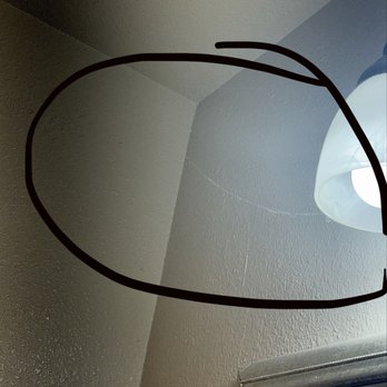 Capri Motel - Spider webs from the lights - Hotels Near Me - Santa Cruz, California Capri Motel - Spider webs from the lights - Hotels Near Me - Santa Cruz, California