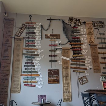 The Local Grind - a variety of items displayed on the wall - Juice Bars & Smoothies Near Me - Franklin, Indiana