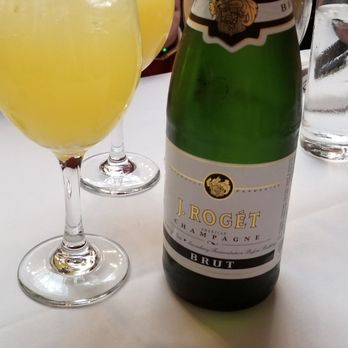 Le Moo - Bottle of champagne since the mimosas were 99% orange juice. - Steakhouses Near Me - Louisville, Kentucky Le Moo - Bottle of champagne since the mimosas were 99% orange juice. - Steakhouses Near Me - Louisville, Kentucky