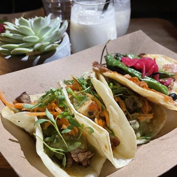 Hermanito - Pictured here: pina colada, steak taco, chicken taco, and shishito pepper. - Mexican Near Me - Los Angeles, California