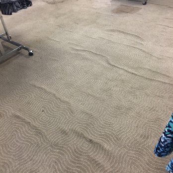 Macy's - Buckling carpet in the women's clothing section. Some of the buckles are so severe they've become a safety hazard. - Department Stores Near Me - Chicago, Illinois