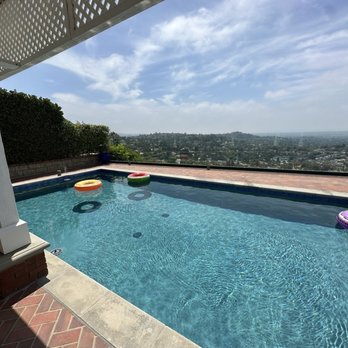 Rox Builders - Pool after re-surfacing and re-tiling - General Contractors Near Me