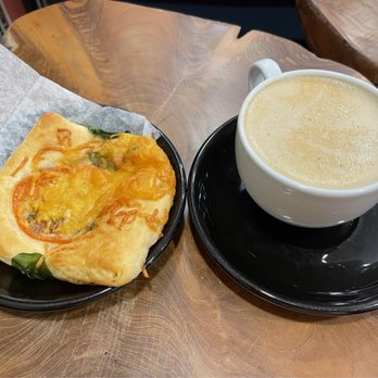 Baldwin & Co. - Tomato, spinach pastry with a "Go tell it on the Mountain" soooo yummy, whew!!! - Bookstores Near Me - New Orleans, Louisiana