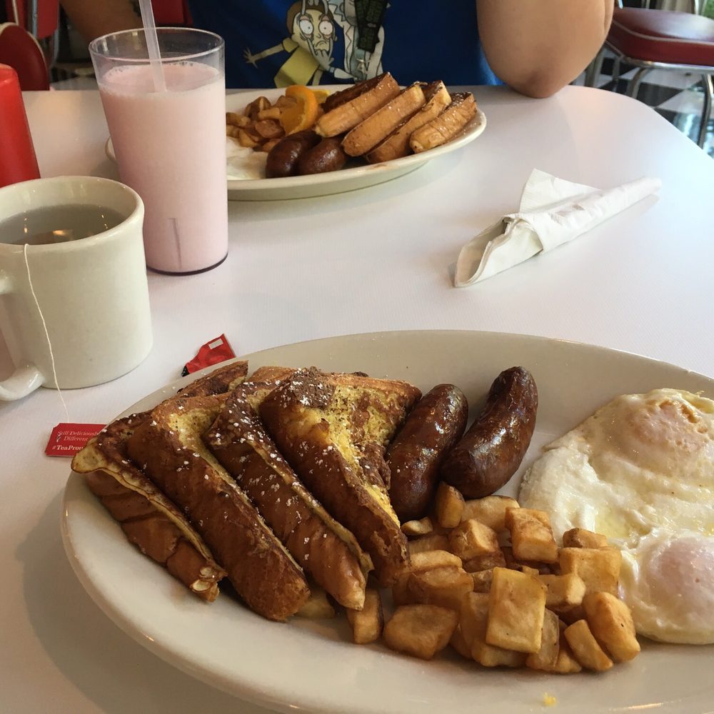Route 50 Diner - French toast, over easy ends, sausage, and home fries. With hot tea and strawberry milk - Breakfast & Brunch Near Me - Ocean City, Maryland Route 50 Diner - French toast, over easy ends, sausage, and home fries. With hot tea and strawberry milk - Breakfast & Brunch Near Me - Ocean City, Maryland
