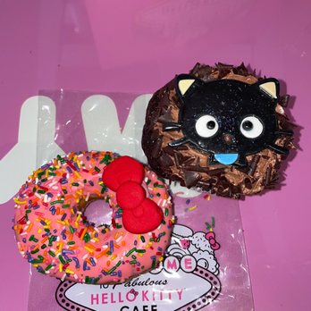 Hello Kitty Cafe - Pink hello kitty donut (left)  Chococat chocolate cupcake with buttercream icing (right) - Themed Cafes Near Me - Las Vegas, Nevada