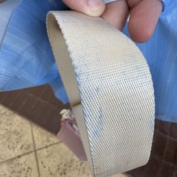 A personal handbag that has been dyed blue by the blue store bag A personal handbag that has been dyed blue by the blue store bag