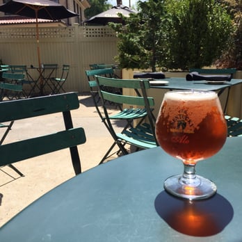 Fitzgerald's 1928 - Kentucky Bourbon Barrel Ale in custom glass dining al fresco. - American Near Me - Glen Ridge, New Jersey