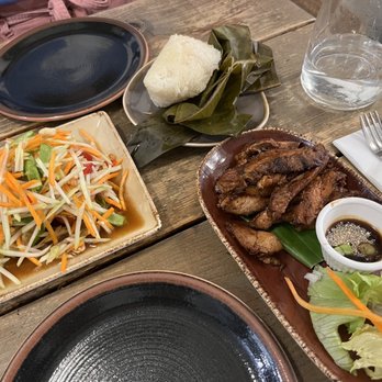 Lao Cafe - Papaya salad mild (still spicy), sticky rice, and pork neck grilled. - Laotian Near Me - London, XGL