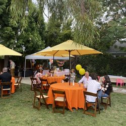 JumperCandy - Had a groovy themed party. The yellow umbrellas and orange linens were amazing!