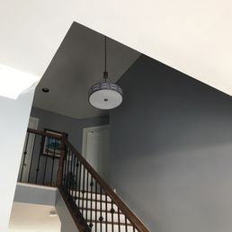 Two story foyer with new light