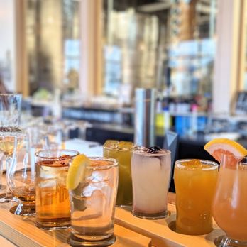 Freeland Spirits - a variety of cocktails on a bar - Distilleries Near Me - Portland, Oregon