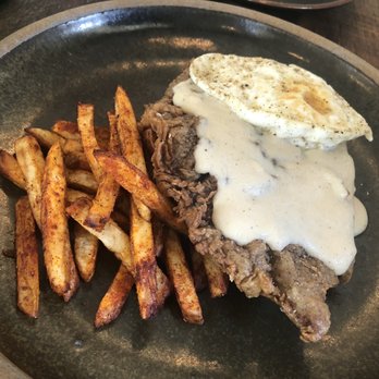 Husk - Country fried steak, fried egg and fries - Southern Near Me - Nashville, Tennessee Husk - Country fried steak, fried egg and fries - Southern Near Me - Nashville, Tennessee