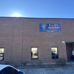 Ruby Auto Collision - In front of the body shop