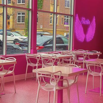 Bussin Burger - tables and chairs in front of a window - Burgers Near Me - Calgary, Alberta Bussin Burger - tables and chairs in front of a window - Burgers Near Me - Calgary, Alberta