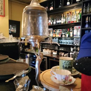 Paris Crepes Cafe - Absinthe dispenser with sherry glasses; slotted spatulas for the sugar cubes. Paris Creperie/Niagara Falls - Creperies Near Me - Niagara Falls, Ontario Paris Crepes Cafe - Absinthe dispenser with sherry glasses; slotted spatulas for the sugar cubes. Paris Creperie/Niagara Falls - Creperies Near Me - Niagara Falls, Ontario
