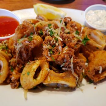 Fish City Grill - Fried calamari with thai chili sauce and tartar sauce. - Seafood Near Me - Flower Mound, Texas Fish City Grill - Fried calamari with thai chili sauce and tartar sauce. - Seafood Near Me - Flower Mound, Texas