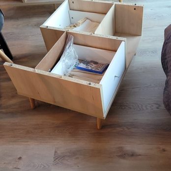 Empire Today - Broken coffee table - Carpet Installation Near Me