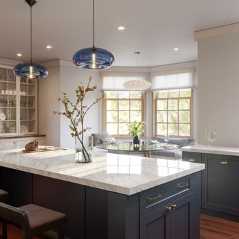 Timeline Contractors - a large kitchen with a center island - General Contractors Near Me - Denver, Colorado