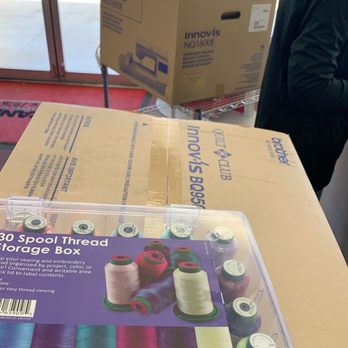 Allbrands Creative Sewing-San Antonio - A sewing machine, embroidery machine and a set of thread all at the check out line. - Fabric Stores Near Me - San Antonio, Texas