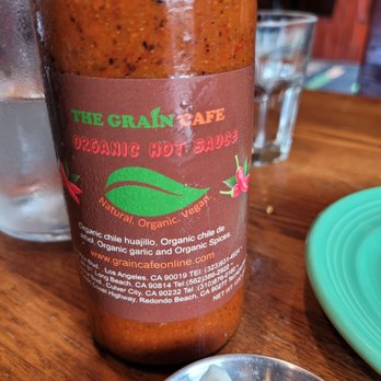 The Grain Cafe - Delicious & organic house hot sauce! Comes with every meal. If you can't handle the spice, ask for the house crema (tofu based) - Pizza Near Me - Redondo Beach, California