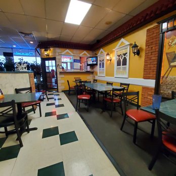 Caretti's Pizza - a dining area with tables and chairs - Pizza Near Me - Chambersburg, Pennsylvania