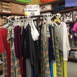 Ocean State Job Lot - Dress rack sign says $10, but only the multicolored striped dress was $10! Deceptive Sales Tactics.