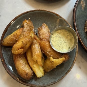Provisional Kitchen - Pesto Aioli Breakfast Potatoes (sauce was requested on the side) - Breakfast & Brunch Near Me - San Diego, California Provisional Kitchen - Pesto Aioli Breakfast Potatoes (sauce was requested on the side) - Breakfast & Brunch Near Me - San Diego, California