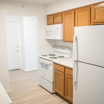 J C Beal Construction - a kitchen with white appliances - General Contractors Near Me - Detroit, Michigan