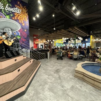 Mercado Gonzalez - food court seating area with live music and a bar - Mexican Near Me - Costa Mesa, California Mercado Gonzalez - food court seating area with live music and a bar - Mexican Near Me - Costa Mesa, California