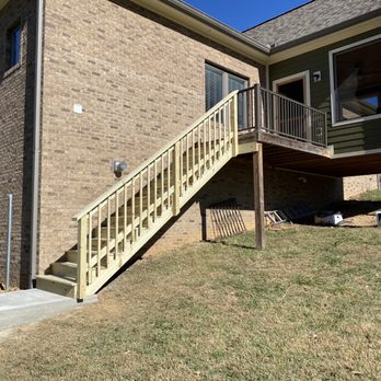 Simple Man Construction & Remodeling - a brick house with stairs - General Contractors Near Me - Kingsport, Tennessee Simple Man Construction & Remodeling - a brick house with stairs - General Contractors Near Me - Kingsport, Tennessee