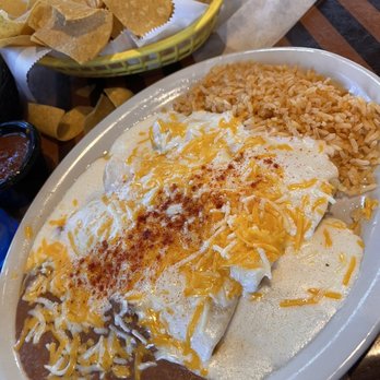 Vallarta Seafood & Grill - Chicken enchiladas with rice and beans. - Seafood Near Me - Fort Worth, Texas Vallarta Seafood & Grill - Chicken enchiladas with rice and beans. - Seafood Near Me - Fort Worth, Texas