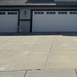 Two new garage doors plus obscured glass windows. Two new garage doors plus obscured glass windows.