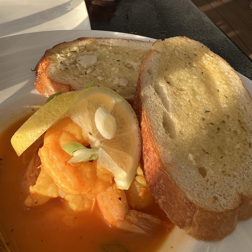 Crane Brook Restaurant - Shrimp Mozambic, with limp bread. - Salad Near Me - Carver, Massachusetts Crane Brook Restaurant - Shrimp Mozambic, with limp bread. - Salad Near Me - Carver, Massachusetts