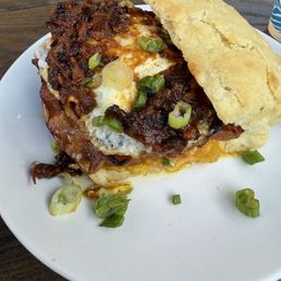 Biscuit with ham, egg, bacon, and bacon jam Biscuit with ham, egg, bacon, and bacon jam