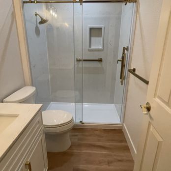 C&C Plumbing - a bathroom with a shower, toilet, and sink - Plumbing Near Me C&C Plumbing - a bathroom with a shower, toilet, and sink - Plumbing Near Me