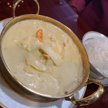 Thai Villa Cuisine - Yellow Curry: sliced meat in yellow curry with coconut milk, potatoes, carrots and onions. - Thai Near Me - Fishers, Indiana Thai Villa Cuisine - Yellow Curry: sliced meat in yellow curry with coconut milk, potatoes, carrots and onions. - Thai Near Me - Fishers, Indiana