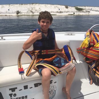 Sun Dogs Parasailing - My 12 year old nephew geared up - Parasailing Near Me - Destin, Florida Sun Dogs Parasailing - My 12 year old nephew geared up - Parasailing Near Me - Destin, Florida
