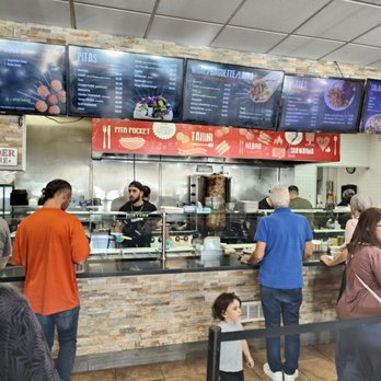 Pita Plus - people ordering food at a restaurant - Mediterranean Near Me - Dania Beach, Florida Pita Plus - people ordering food at a restaurant - Mediterranean Near Me - Dania Beach, Florida
