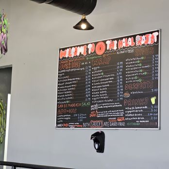 The Halal Project - a menu on the wall - Halal Near Me - San Marcos, Texas
