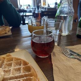 Mimosa (with Cranberry) Mimosa (with orange juice in the back)